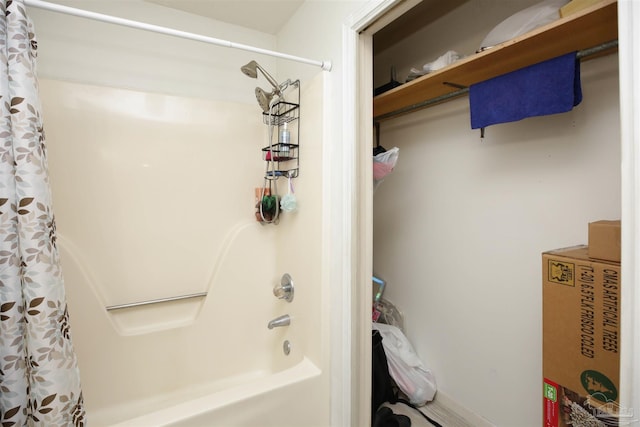 bathroom with shower / tub combo