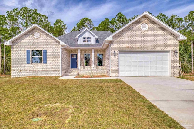 view of front of property featuring an attached garage, brick siding, driveway, and a front yard