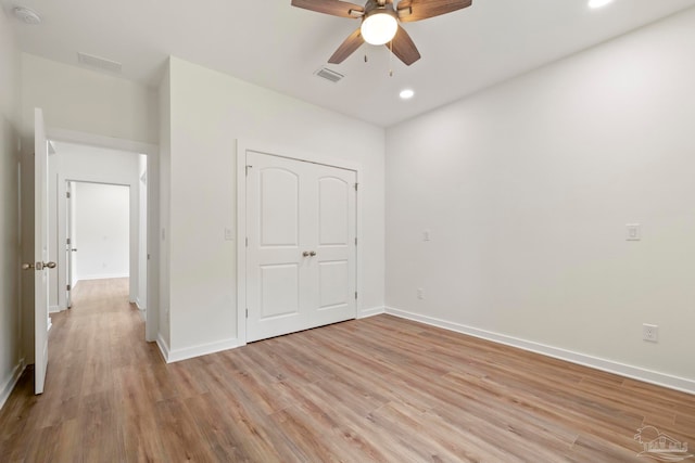 unfurnished bedroom featuring recessed lighting, visible vents, light wood-style floors, ceiling fan, and baseboards