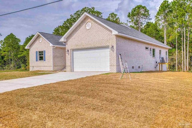 view of front facade with a garage, concrete driveway, brick siding, and a front yard