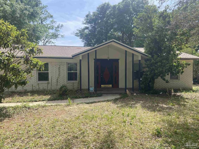 4551 Creighton Rd, Pensacola, FL 32504 - ranch-style house featuring a front yard and brick siding