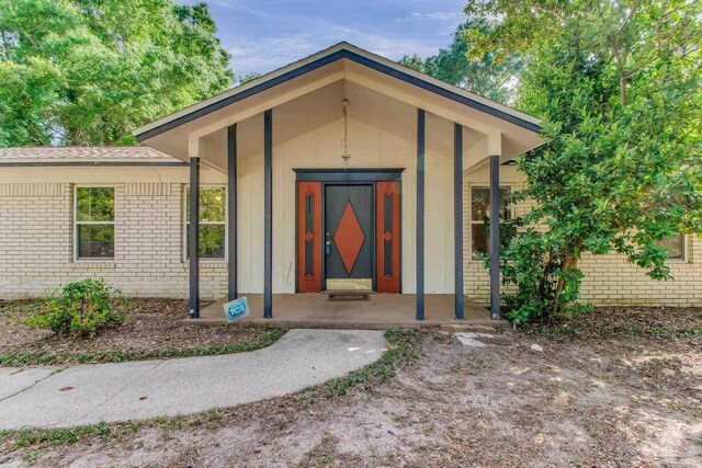 4551 Creighton Rd, Pensacola, FL 32504 - entrance to property featuring brick siding