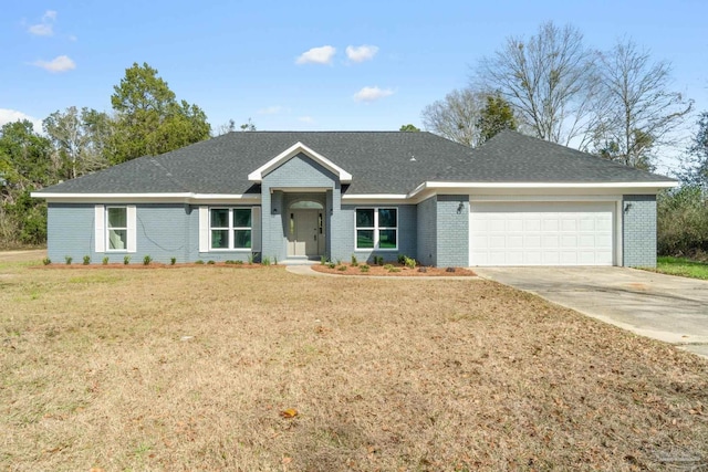 ranch-style house with a garage and a front lawn