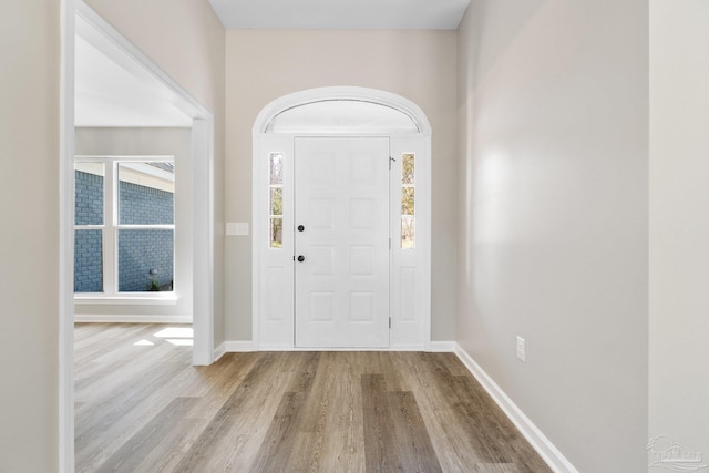 foyer with light hardwood / wood-style floors