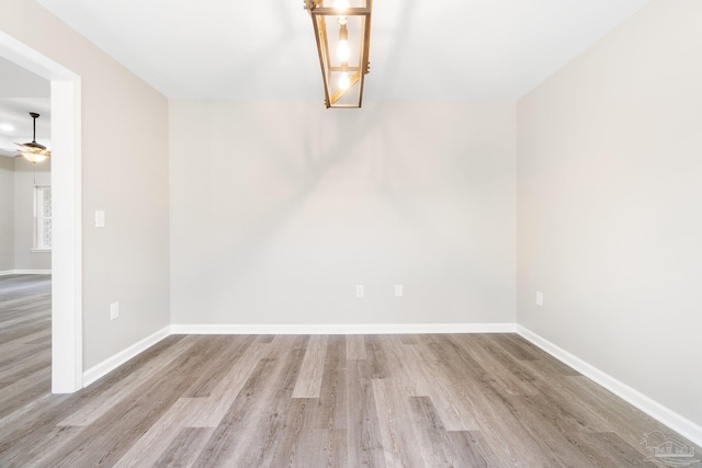 unfurnished dining area featuring ceiling fan and light hardwood / wood-style flooring