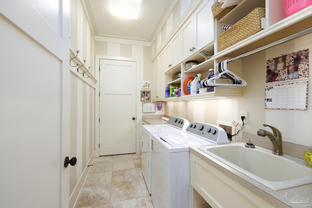 9 N Sunset Blvd, Gulf Breeze, FL 32561 - washroom with washing machine and clothes dryer and cabinet space
