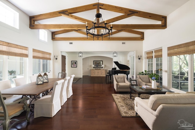 9 N Sunset Blvd, Gulf Breeze, FL 32561 - living room featuring beam ceiling, a chandelier, plenty of natural light, dark wood finished floors, and a towering ceiling