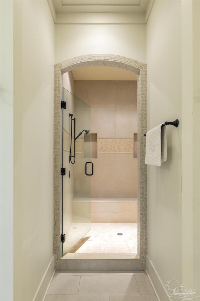 9 N Sunset Blvd, Gulf Breeze, FL 32561 - full bath featuring tile patterned flooring, a shower stall, and crown molding