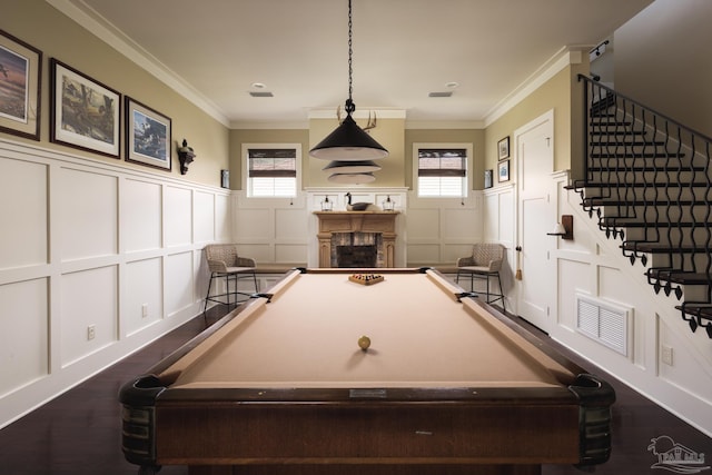 9 N Sunset Blvd, Gulf Breeze, FL 32561 - rec room featuring a decorative wall, dark wood-style floors, a fireplace, billiards, and wainscoting
