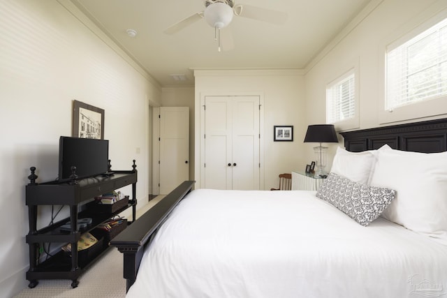 9 N Sunset Blvd, Gulf Breeze, FL 32561 - bedroom with ornamental molding, carpet, a closet, and a ceiling fan