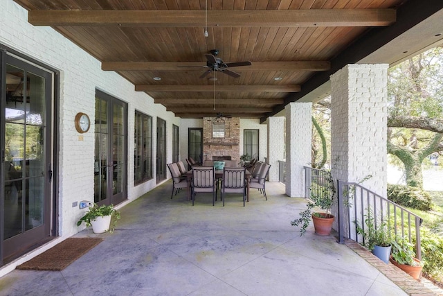 9 N Sunset Blvd, Gulf Breeze, FL 32561 - view of patio / terrace with a ceiling fan and outdoor dining space