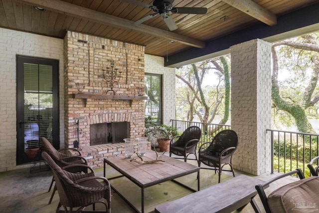 9 N Sunset Blvd, Gulf Breeze, FL 32561 - view of patio with an outdoor brick fireplace and a ceiling fan
