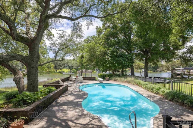 9 N Sunset Blvd, Gulf Breeze, FL 32561 - view of pool featuring a water view and view of wooded area