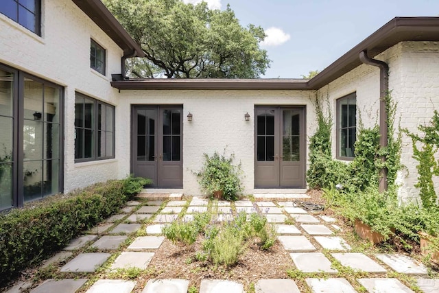 9 N Sunset Blvd, Gulf Breeze, FL 32561 - entrance to property with french doors and brick siding