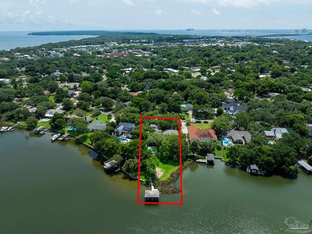 9 N Sunset Blvd, Gulf Breeze, FL 32561 - aerial view of property's location featuring a large body of water, property parcel outlined, and a notable bridge