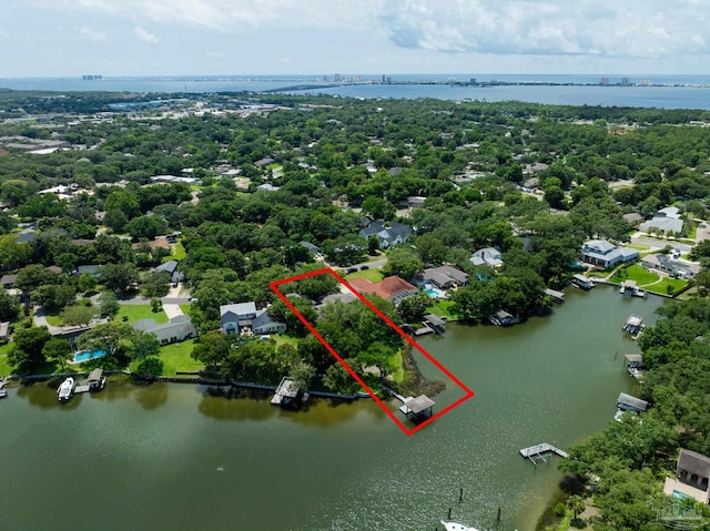9 N Sunset Blvd, Gulf Breeze, FL 32561 - aerial view of property and surrounding area featuring a large body of water, property boundaries highlighted, and a notable bridge