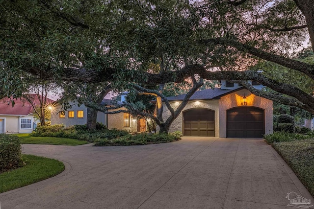 9 N Sunset Blvd, Gulf Breeze, FL 32561 - view of front of property featuring driveway and a garage