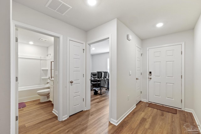 foyer featuring hardwood / wood-style flooring