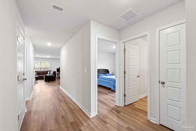 hall featuring light hardwood / wood-style flooring