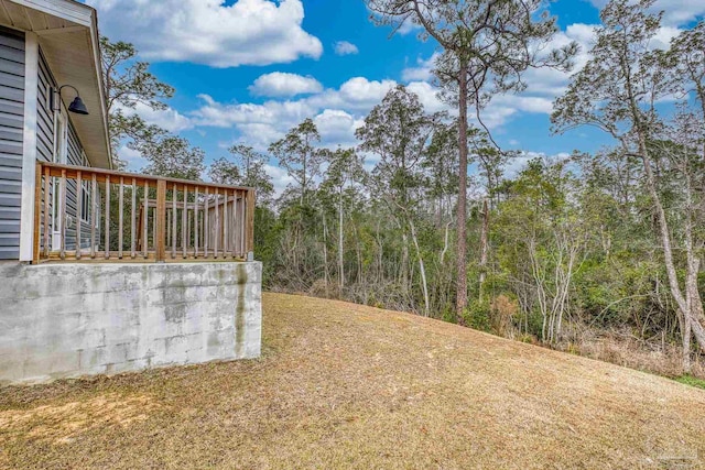 view of yard featuring a deck