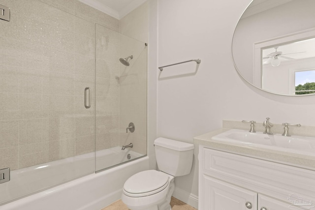 full bathroom with toilet, vanity, ornamental molding, ceiling fan, and enclosed tub / shower combo