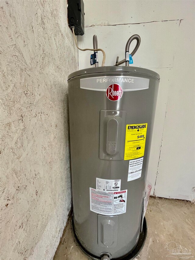 utility room with electric water heater