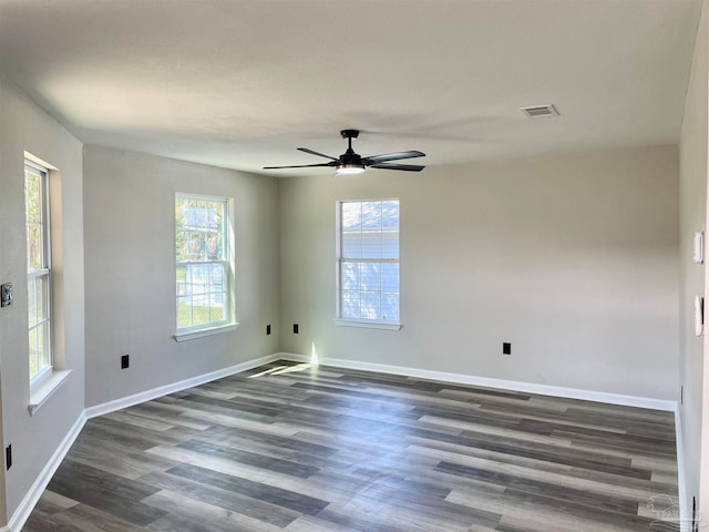 unfurnished room with ceiling fan and hardwood / wood-style flooring