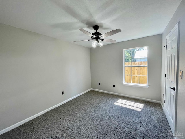 unfurnished bedroom featuring carpet floors and ceiling fan