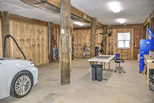 workout area featuring cooling unit and concrete floors