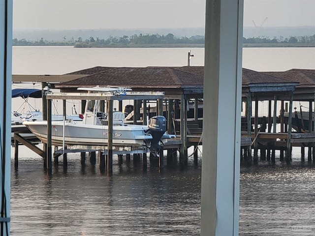 dock area featuring a water view