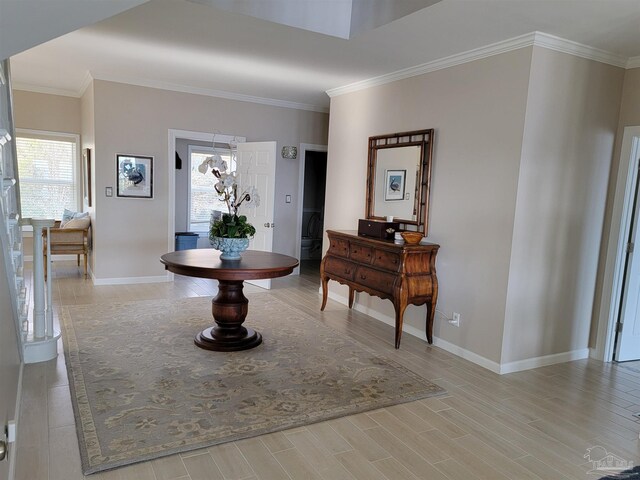 living room featuring a fireplace, crown molding, and hardwood / wood-style floors