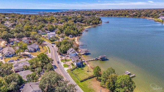 bird's eye view with a water view and a residential view