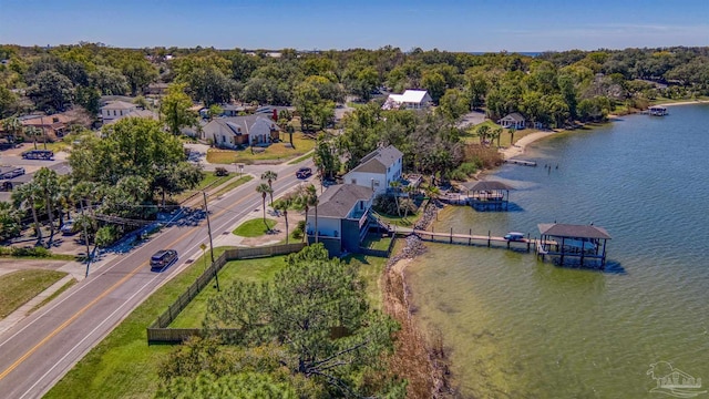 drone / aerial view featuring a water view and a residential view