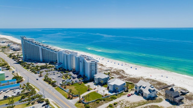 bird's eye view with a view of the beach and a water view