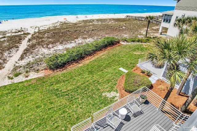 aerial view featuring a water view and a beach view