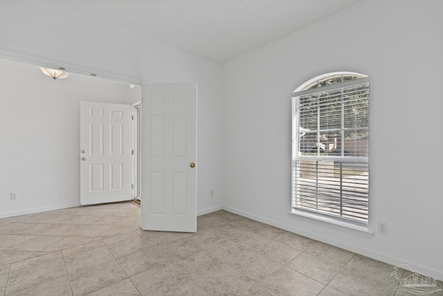 view of tiled spare room