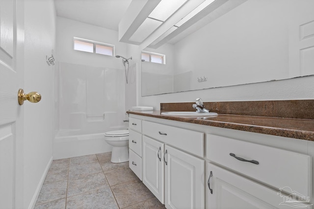 full bathroom with tile patterned flooring, vanity, bathtub / shower combination, and toilet