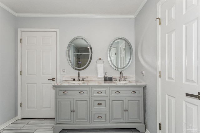4122 Cobia St, Pensacola, FL 32507 - bathroom featuring ornamental molding, double vanity, and baseboards