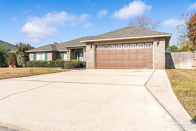 ranch-style house with a front lawn and a garage