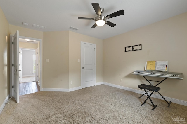 unfurnished bedroom with visible vents, baseboards, a ceiling fan, and carpet floors