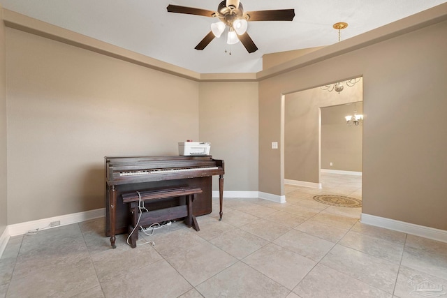 7850 Amethyst Dr, Pensacola, FL 32506 - living area with ceiling fan, light tile patterned floors, a chandelier, and baseboards