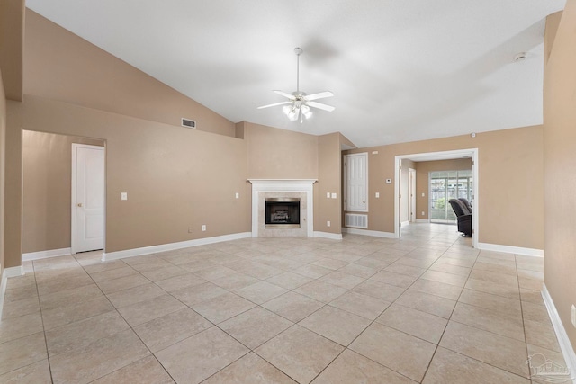 7850 Amethyst Dr, Pensacola, FL 32506 - unfurnished living room with a ceiling fan, light tile patterned floors, a tile fireplace, baseboards, and high vaulted ceiling
