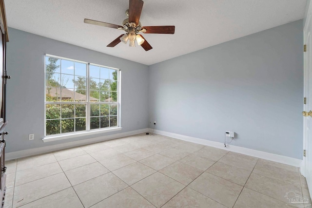7850 Amethyst Dr, Pensacola, FL 32506 - unfurnished room featuring a ceiling fan, light tile patterned flooring, and baseboards