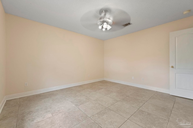 7850 Amethyst Dr, Pensacola, FL 32506 - spare room featuring ceiling fan, light tile patterned flooring, and baseboards