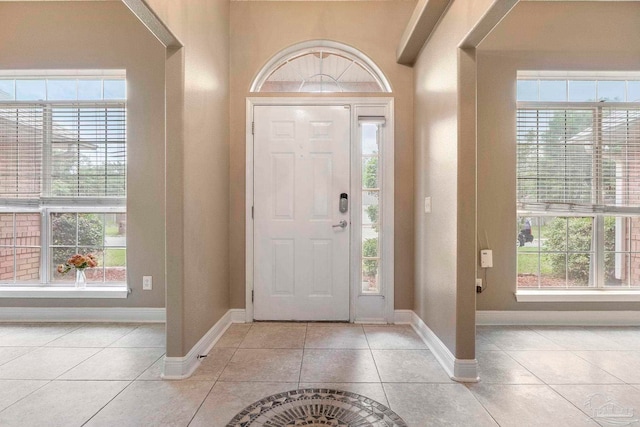 7850 Amethyst Dr, Pensacola, FL 32506 - entryway with tile patterned flooring and baseboards