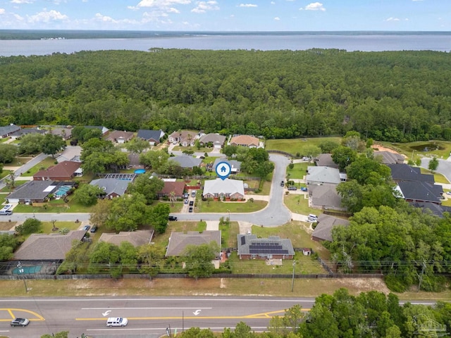 7850 Amethyst Dr, Pensacola, FL 32506 - aerial view of property's location featuring a heavily wooded area, a large body of water, and nearby suburban area