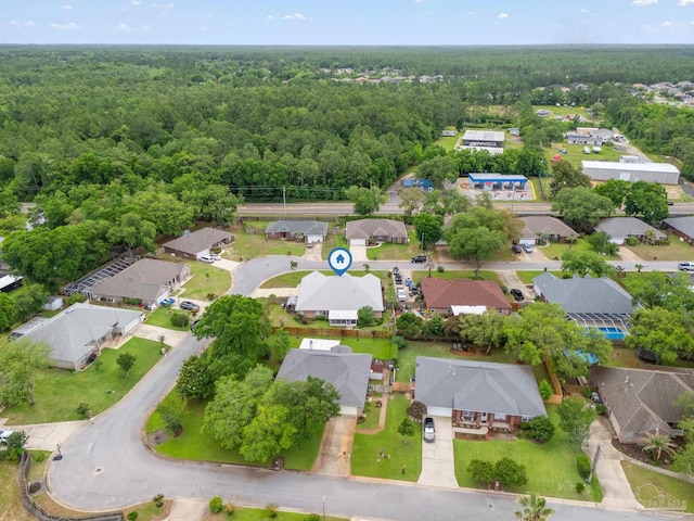 7850 Amethyst Dr, Pensacola, FL 32506 - aerial overview of property's location featuring a forest and nearby suburban area