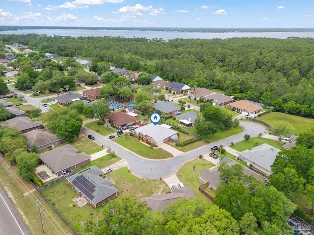 7850 Amethyst Dr, Pensacola, FL 32506 - aerial view of property's location featuring nearby suburban area, a large body of water, and a heavily wooded area