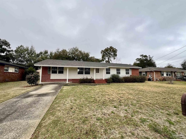 single story home with a front lawn, driveway, brick siding, and roof with shingles