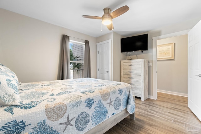 bedroom featuring ceiling fan and light wood-type flooring